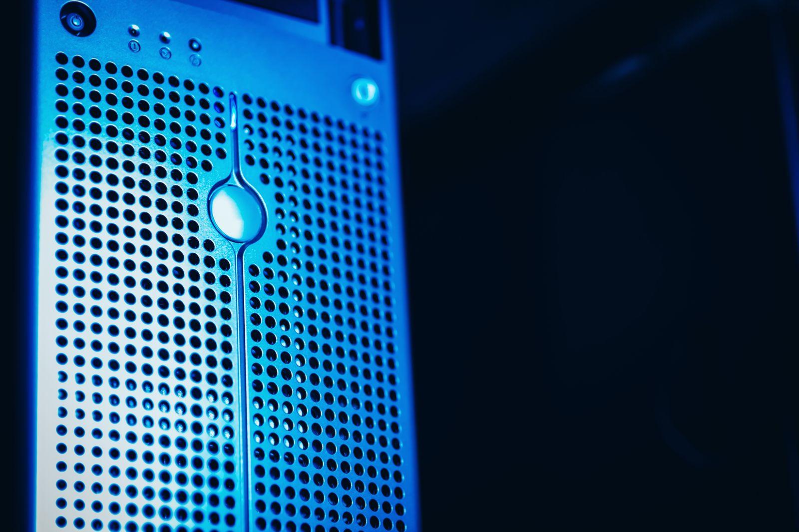 A modern server rack with blue lighting in a data center